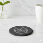Personalized slate coaster with antler and shield rustic crest